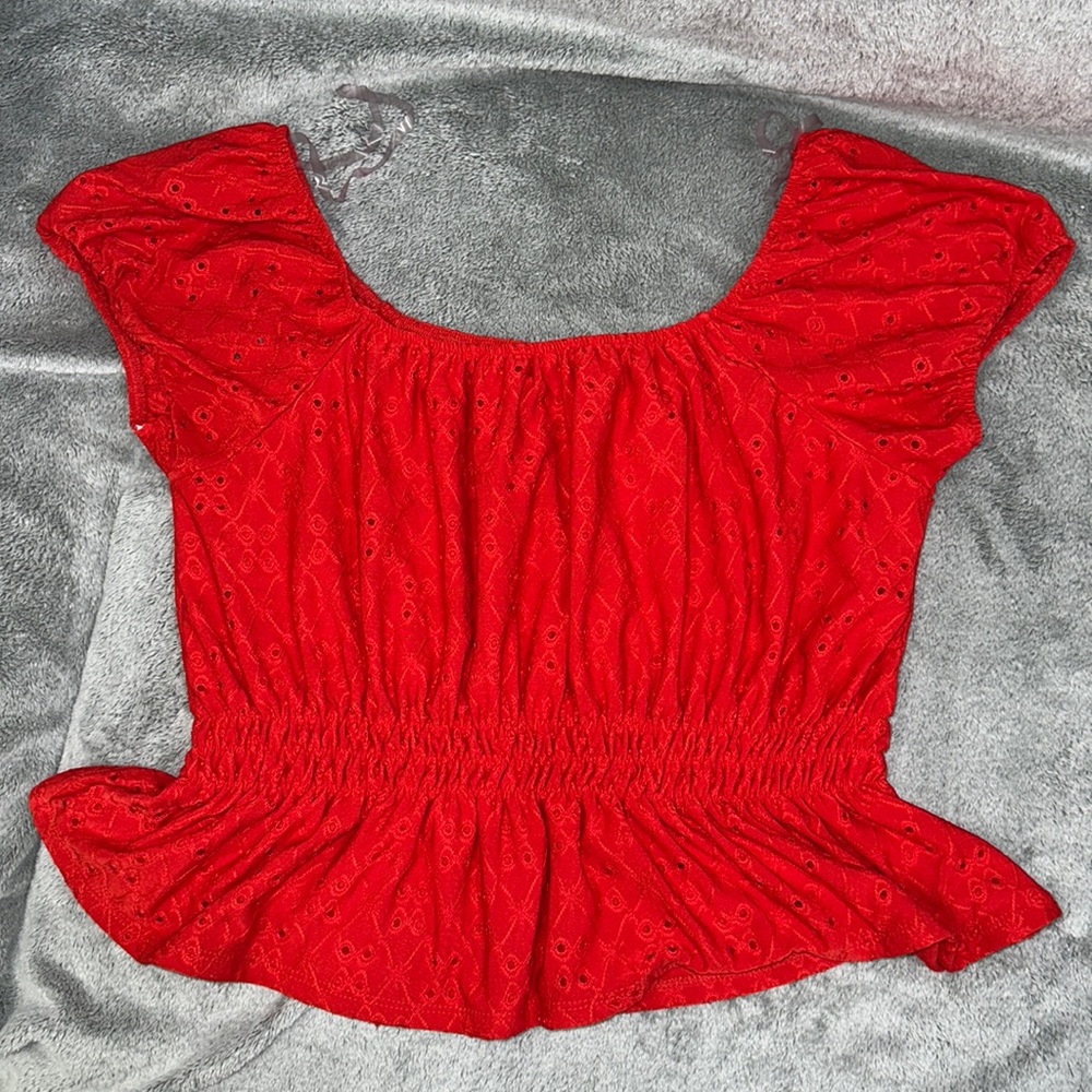 Red crop top.